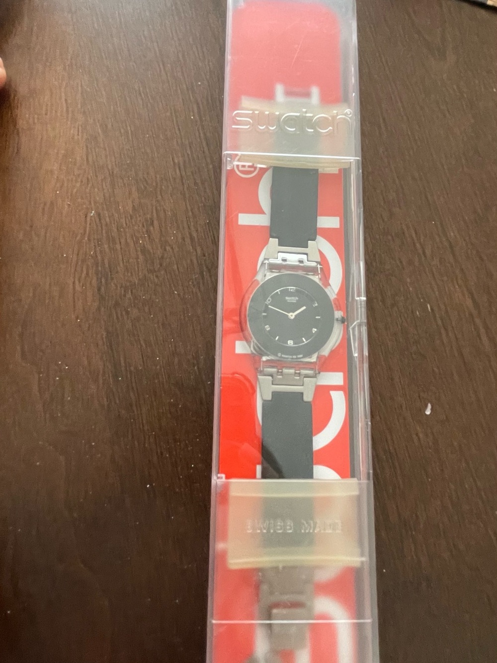 Swatch unisex Black and Silver Dial Watch